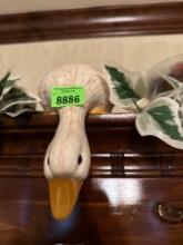 hanging geese and greenery