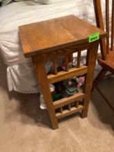 Side table, lotion, and greenery