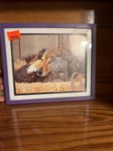 2 animal pictures in frame