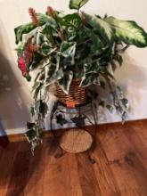 Plant stand with flower arrangement