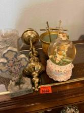 Snow globe, cross, sconce and other decor