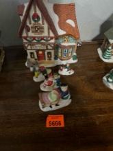 Christmas village book store with Christmas figurines