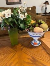 Fruit bowl with fake fruit and artifical flowers in vase