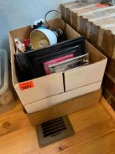 Box with desk lamp, christmas decor, picture frames and more