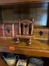 Ceramic "doll" size rocking chair and small decorative chest