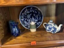 Blue/white decorative plate, Blue/white flower tea pot, blue vase and blue candle