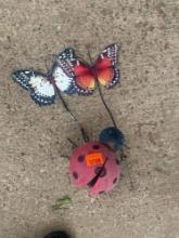 2 butterfly and one lady bug yard decoration