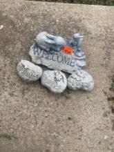 Welcome sign and rocks with words yard decor
