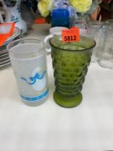 Green vase and cup with duck decor