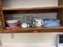 Items on shelf - Coffee cups, bowls, and dog bowl