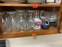 Items in shelf Decorative glasses and coffee mugs
