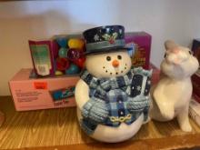Snowman cookie jar, rabbit figures, egg tree, resurrection eggs