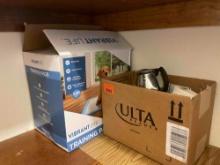 Dog training pads, box with various glassware and fall items