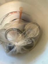 5 gallon bucket with empty jars