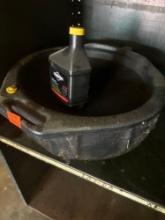 Oil pan and bottle of oil