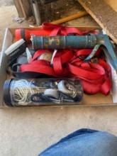 Items in box which include caulking gun, Straps and other various items