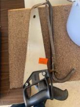 Hand saw and pry bar