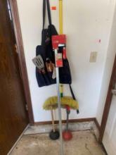 Large clamp, dust mop, 2 plungers and bbq utensils with an apron