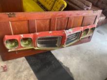 Door with a Plymouth grill attached