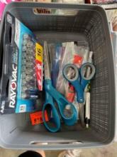 Batteries, scissors in tub