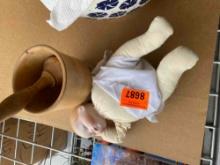 Wooden mortor and pestle and a doll