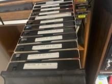 various VHS tapes and storage drawers