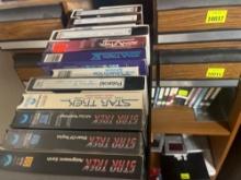 various VHS tapes and storage drawers