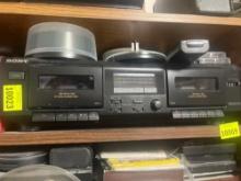 Sony cassette tape player/radio; various cassette tapes