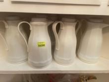 7 vintage white insulated pitchers