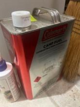 Coleman camp fuel; broom; tomato set spray