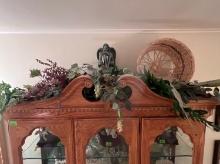 decorative foliage, angel statue with harp, wicker basket