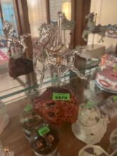 glass carousel horse on wood base