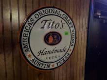 Titos vodka metal sign