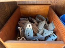 Metal brackets, containers of nails, screws and plastic separators