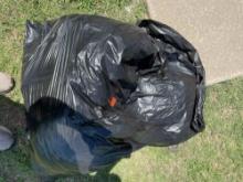 Trash bag full of pillows
