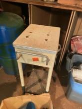 Vintage metal table, possibly from a medical office
