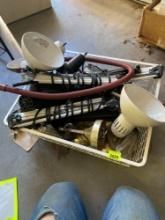 Metal basket full of light fixtures