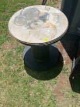 Round homemade table with metal top that comes off