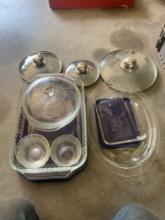 Pyrex dishes with lids and 3 separate pan lids
