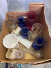 Various vases, one Coca-Cola cup