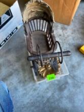 Gold colored flower, fleur de lis, 2 brass seashells and a Doll vintage baby carriage