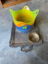 4 colorful baskets and a silver serving platter