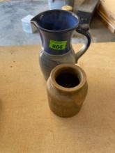 Two pieces of studio pottery a picture and a brown preserved pot