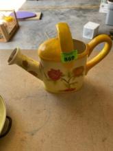 Decorative ceramic watering can with painted floral design