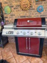 Char Broil red grill, with cover