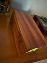 wooden box with knitting and nail clippers