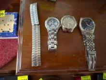 Three watches and one watchband