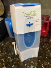 Tea maker and pitcher and cutting board