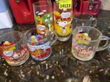 Cartoon mugs, butterfly mug, and OU mug