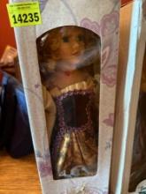 2 porcelain dolls in their box